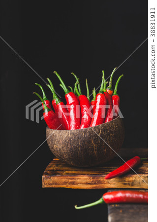 Red chillies on the old wood Red chillies on the old wood 38831911