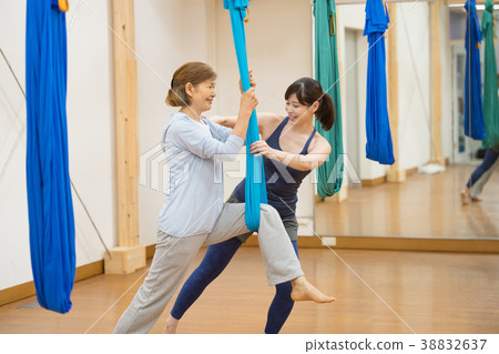 Aerial yoga gym gym senior woman image 38832637