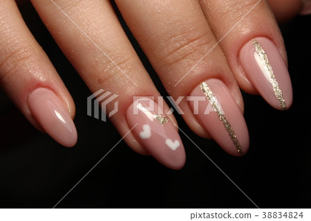 Christmas design manicure with snowflakes. Christmas design manicure with snowflakes. 38834824