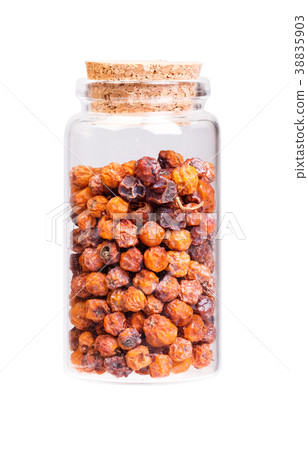 Dry rowan in a bottle with cork stopper for 38835903