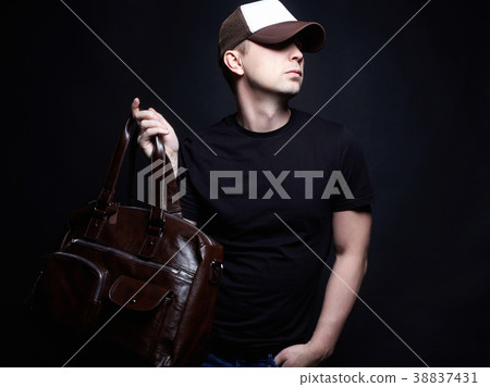 fashion Portrait of a young man with handbag fashion Portrait of a young man with handbag 38837431