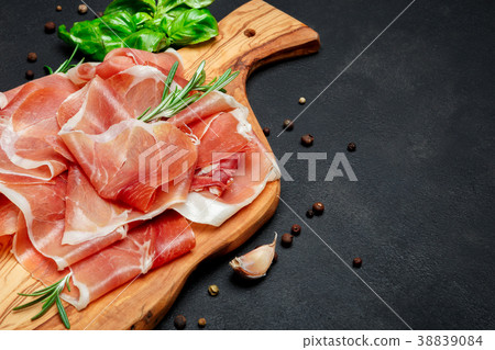 Italian prosciutto crudo or spanish jamon. Raw ham 38839084