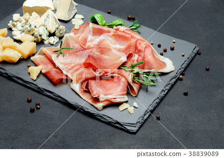 Italian prosciutto crudo or spanish jamon and 38839089