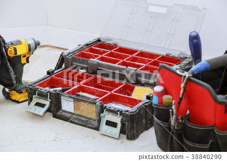 Well used old tools and red tool box 38840290