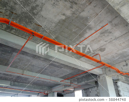 Installing electrical conduit and cable tray Installing electrical conduit and cable tray 38844748