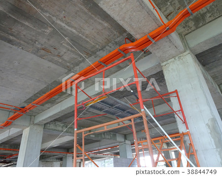 Installing electrical conduit and cable tray Installing electrical conduit and cable tray 38844749