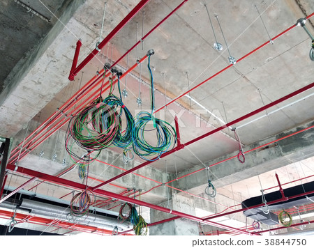 Installing electrical conduit and cable tray Installing electrical conduit and cable tray 38844750