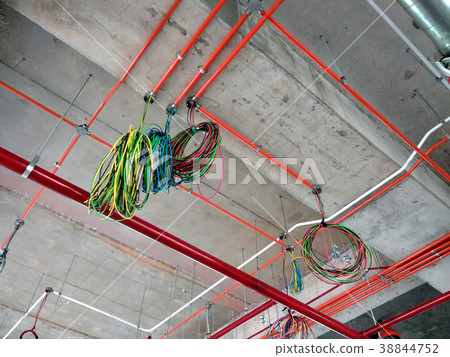 Installing electrical conduit and cable tray Installing electrical conduit and cable tray 38844752