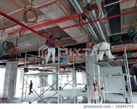 Installing electrical conduit and cable tray Installing electrical conduit and cable tray 38844753