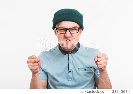 portrait of young angry man on white background portrait of young angry man on white background 38845674