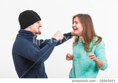 Woman victim of violence and abuse. Criminal man 38845683