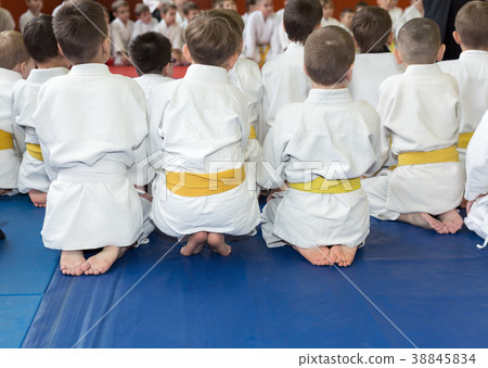 Children in kimono sitting on tatami on martial Children in kimono sitting on tatami on martial 38845834