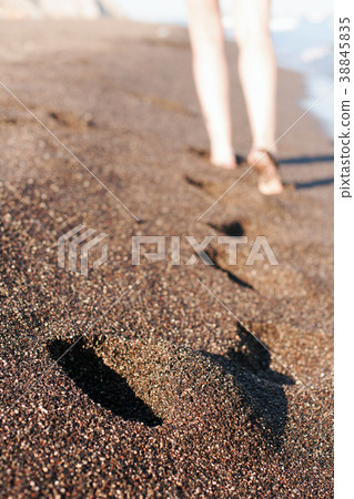 Footsteps on the black sand Footsteps on the black sand 38845835