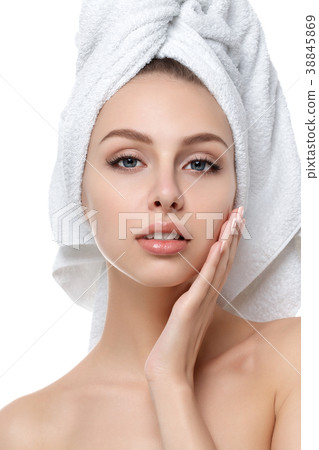 Portrait of young beautiful woman touching face Portrait of young beautiful woman touching face 38845869