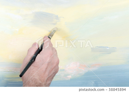An artist painting in studio An artist painting in studio 38845894