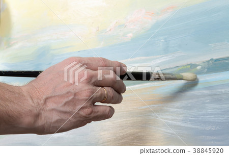 An artist painting in studio An artist painting in studio 38845920