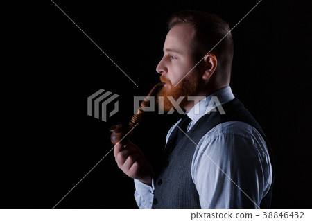 man smoking a pipe man smoking a pipe 38846432