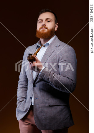 man smoking a pipe man smoking a pipe 38846438