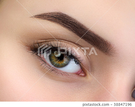 Close up view of beautiful brown female eye Close up view of beautiful brown female eye 38847196