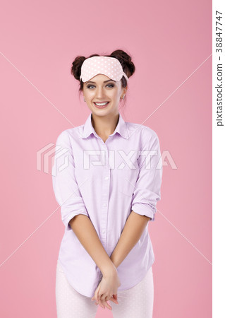woman in pajamas and mask for sleeping 38847747