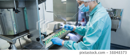 Pharmaceutical industry man worker in protective Pharmaceutical industry man worker in protective 38848373