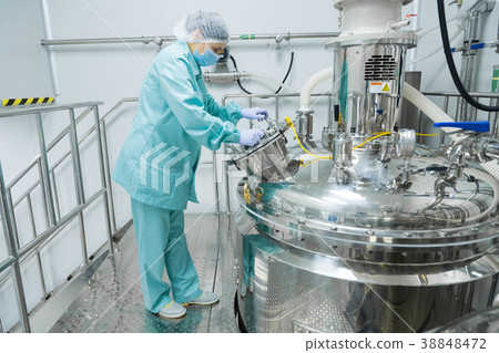 Pharmaceutical factory woman worker in protective Pharmaceutical factory woman worker in protective 38848472