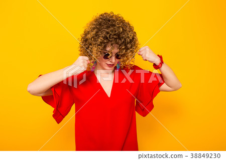 Attractive woman with short curly hair Attractive woman with short curly hair 38849230