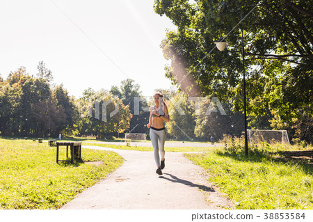 healthy lifestyle young fitness woman running 38853584