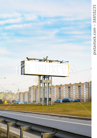 Blank white billboard on highway, mock up 38858235