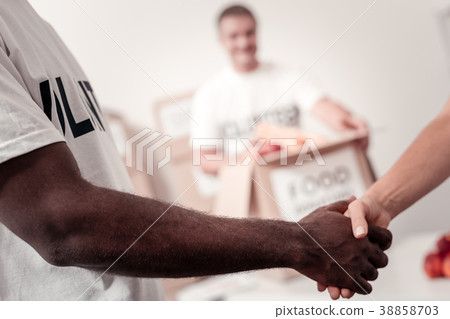 Close up of people that shaking hands Close up of people that shaking hands 38858703