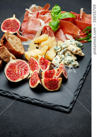 Italian prosciutto crudo or spanish jamon, cheese Italian prosciutto crudo or spanish jamon, cheese 38858709