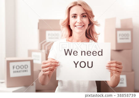 Confident blonde calling new people to her group 38858739