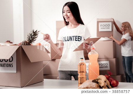 Attentive assistant checking the amount of Attentive assistant checking the amount of 38858757