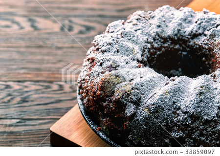 Chocolate cake with sour cherries and wallnuts on Chocolate cake with sour cherries and wallnuts on 38859097