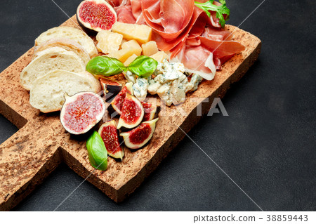Italian prosciutto crudo or spanish jamon, cheese 38859443