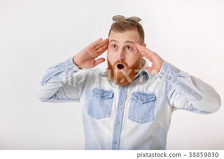 beard man in sunglasses and denim shirt 38859830