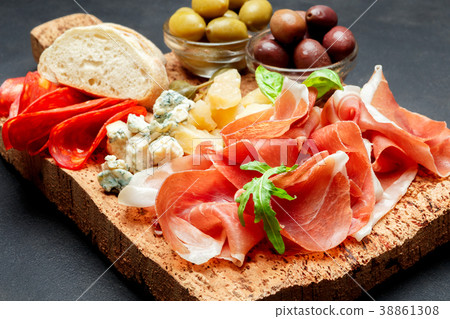 Italian prosciutto crudo or spanish jamon, cheese 38861308