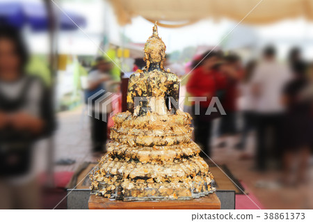 Buddha meditating on a lotus base 5 step. 38861373