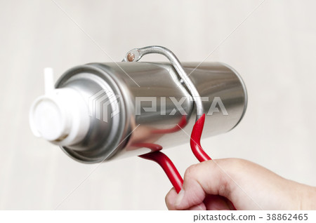 Make a hole in the spray can Make a hole in the spray can 38862465