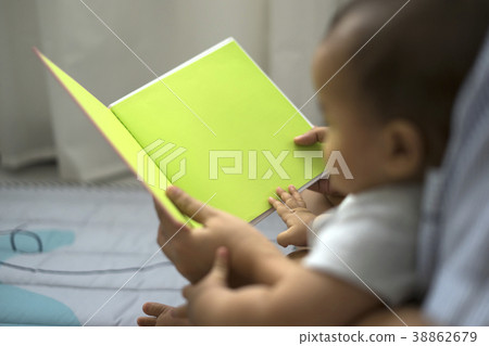 Mother and baby reading a fable tale story Mother and baby reading a fable tale story 38862679