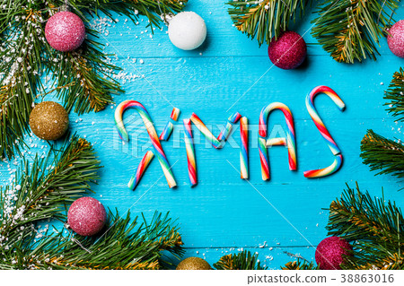 Photo of blue table with spruce branches, colorful Photo of blue table with spruce branches, colorful 38863016