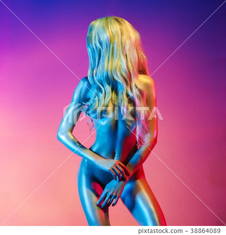 Nude sexy blonde in colorful light. Nude sexy blonde in colorful light. 38864089