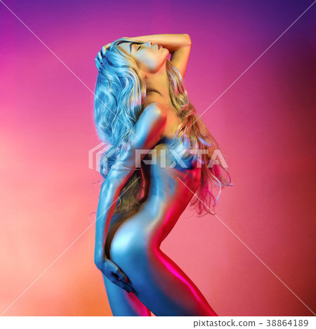 Nude sexy blonde in colorful light. Nude sexy blonde in colorful light. 38864189