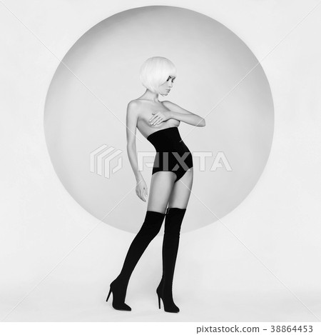 Elegant sensual woman on geometric background Elegant sensual woman on geometric background 38864453