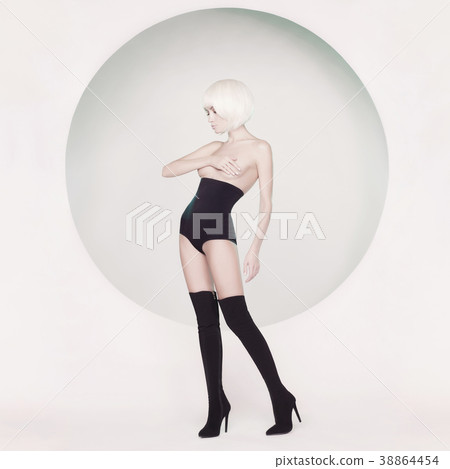 Elegant sensual woman on geometric background Elegant sensual woman on geometric background 38864454