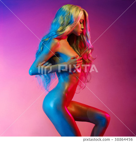 Nude sexy blonde in colorful light. Nude sexy blonde in colorful light. 38864456