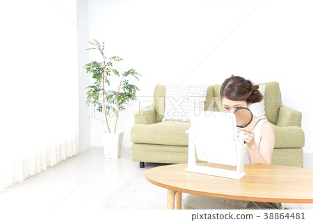 Skin care and magnifying glass 38864481