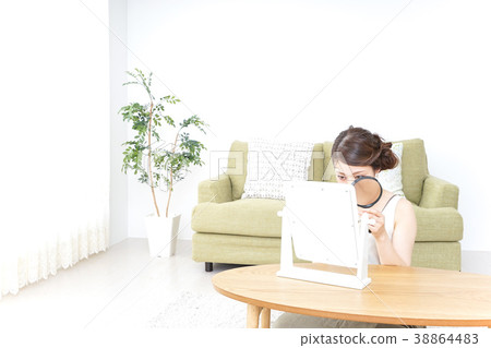 Skin care and magnifying glass 38864483