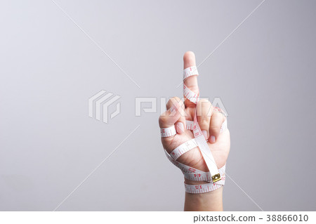 Hand with fuck you gesture wrapped 38866010