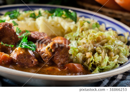 Traditional irish stew served with potatoes Traditional irish stew served with potatoes 38866253